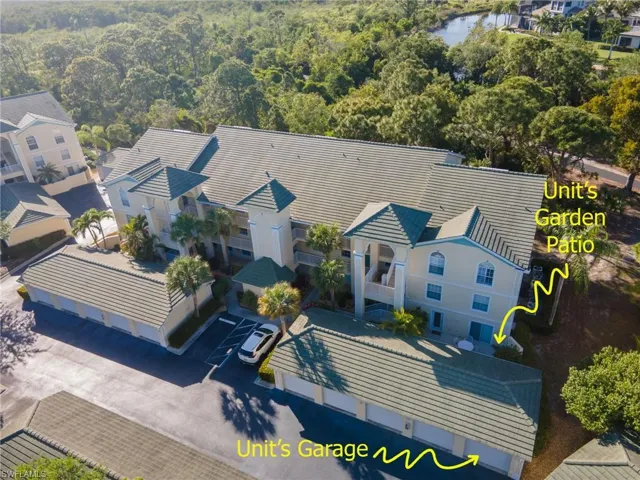 The property features a multi-story structure with a tiled roof, a dedicated garage, and a private garden patio