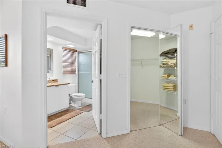 The primary en suite features a walk-in closet and private bath.