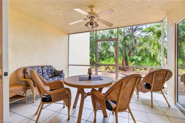 The lanai is roomy enough for dining and lounging. A natural privacy barrier separates the unit from Bay Forest's trail--easy access for your morning walks!