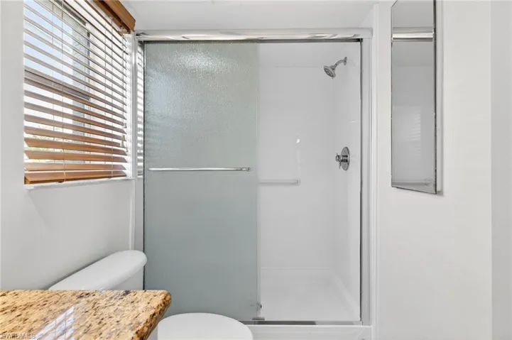 The shower surround and doors were replaced in 2024.