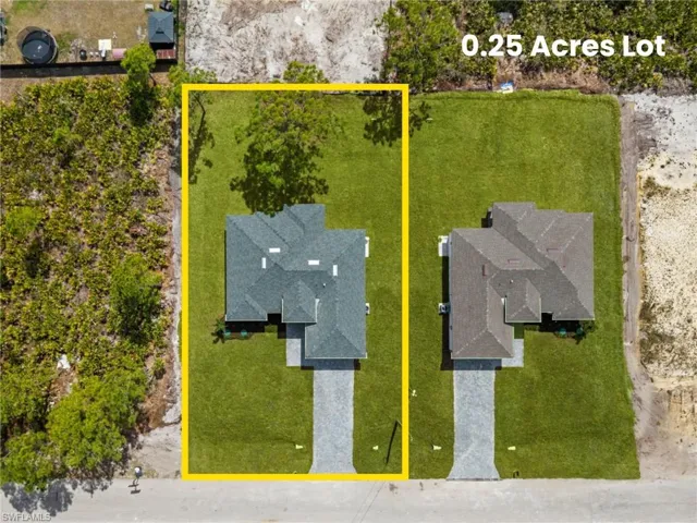 Aerial view of residential area with property boundaries highlighted