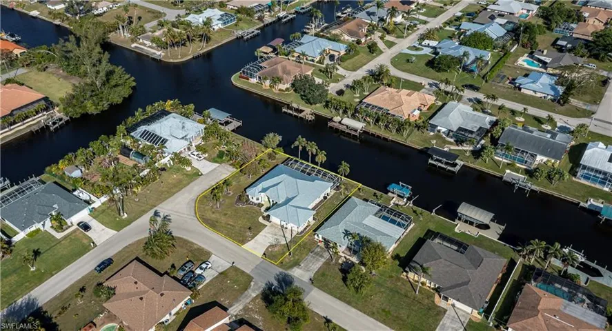 View of property location with nearby suburban area