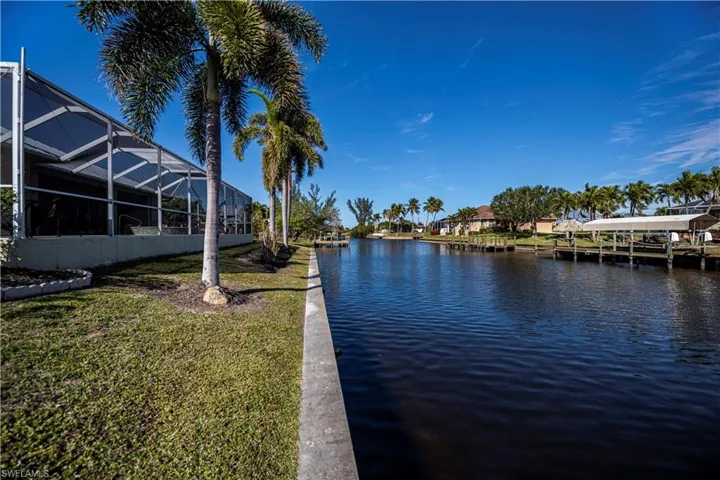 Water view featuring a dock
