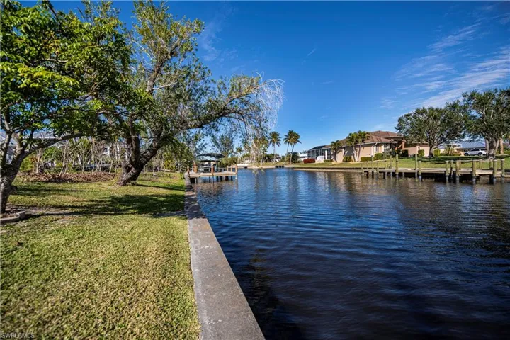 Water view with a dock