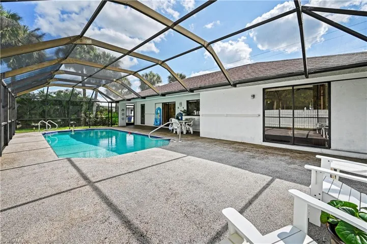 View of pool featuring a lanai and a patio