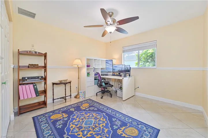 Tiled office space with ceiling fan