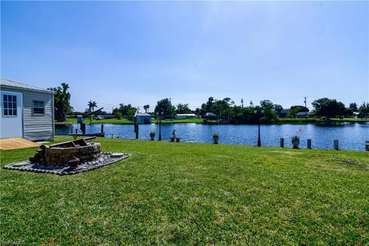 Water view with an outdoor fire pit