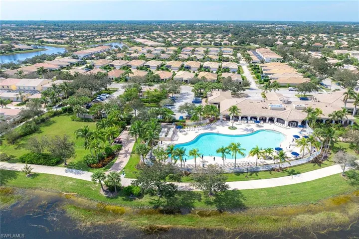 View of property location with a large body of water and nearby suburban area