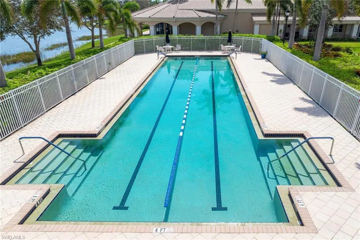 Community pool featuring a patio area and a gazebo