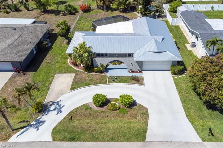 Aerial view of property and surrounding area