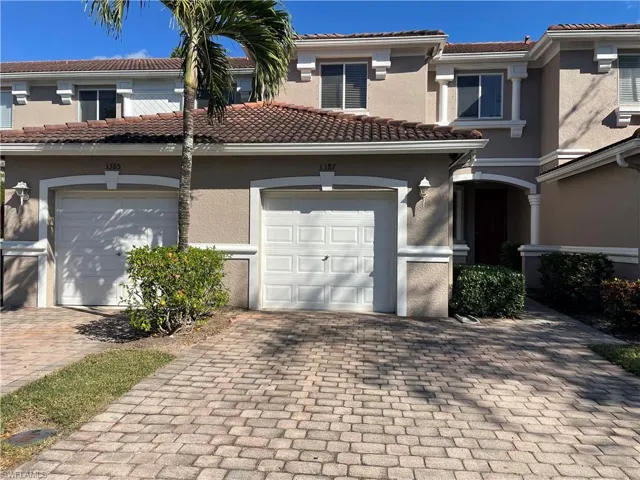 View of front of home featuring a garage