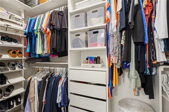 View of walk in closet with upgraded finished materials