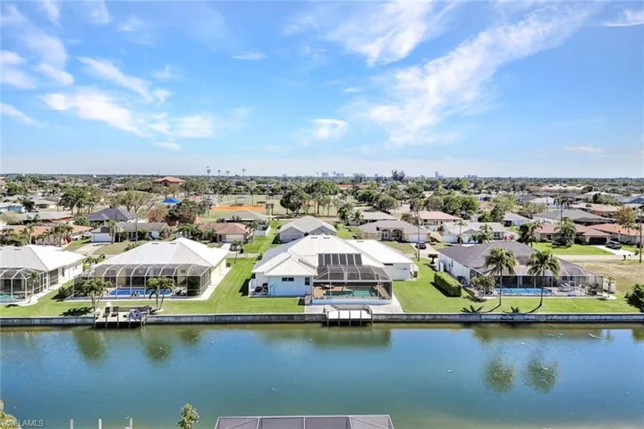 Bird's eye view with a residential view and a water view