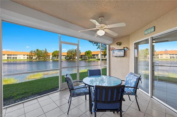 Private lanai area featuring sitting area and lake views