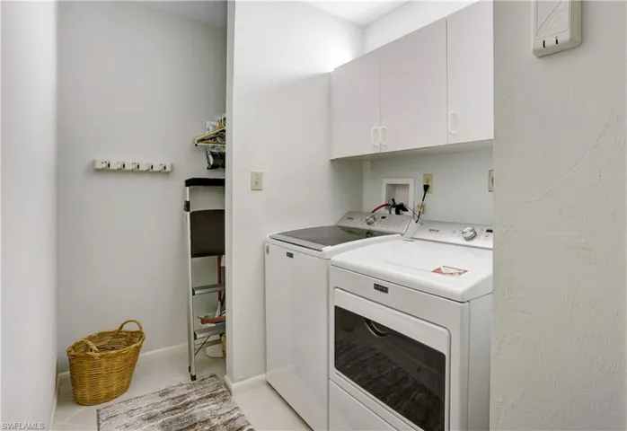 Separate laundry room with newer Maytag full size appliances.