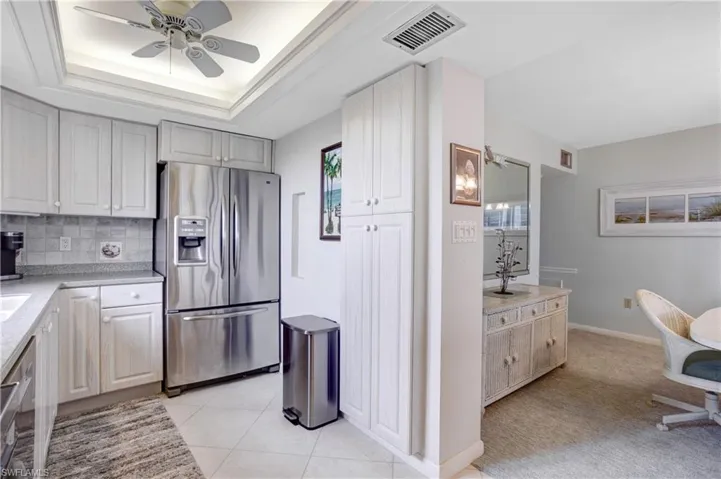 Kitchen opens up to the dining and family room.