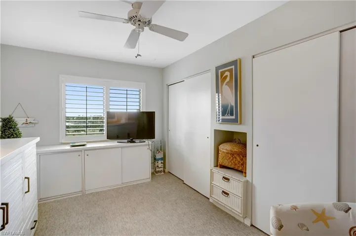 An abundance of cabinets and storage, plantation shutters