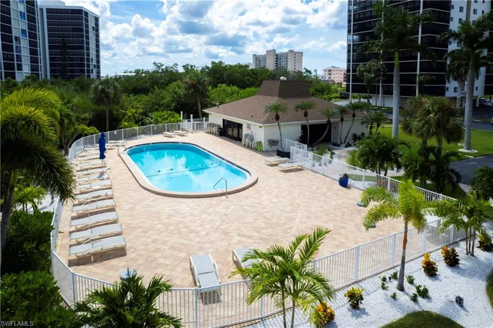Pool with plenty of sun, far enough from towering buildings to not shade the area