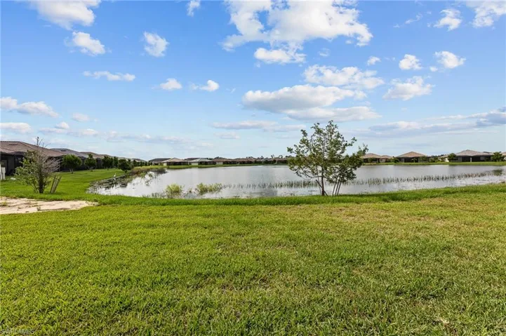 Water view featuring nearby suburban area
