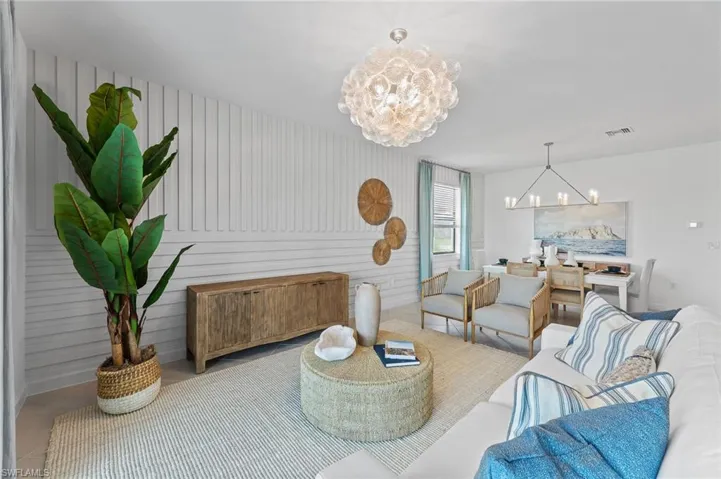 Living room featuring a chandelier
