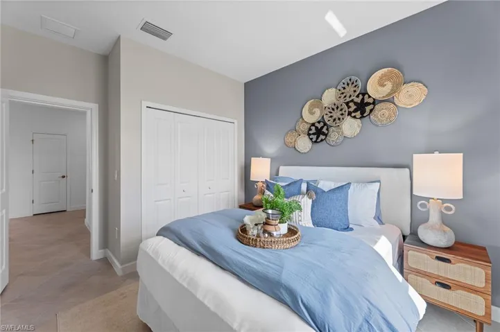 Bedroom featuring a closet and baseboards