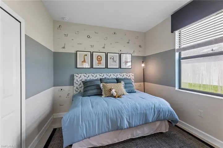 Bedroom featuring baseboards