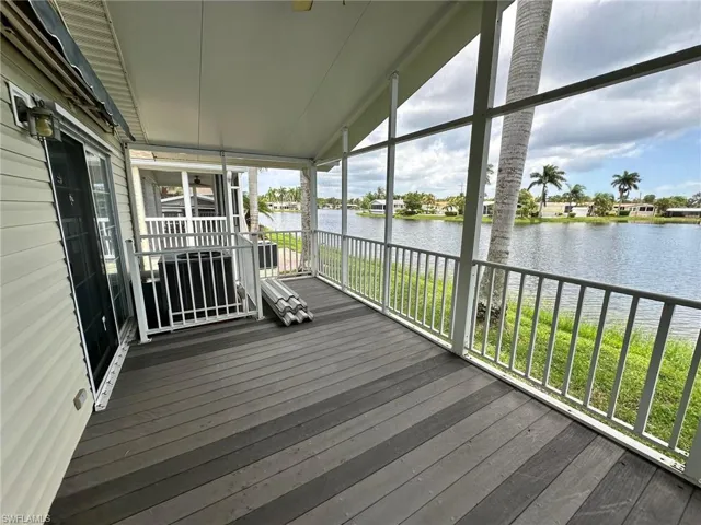 Deck featuring a water view
