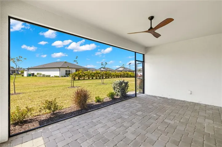 View of patio with a ceiling fan