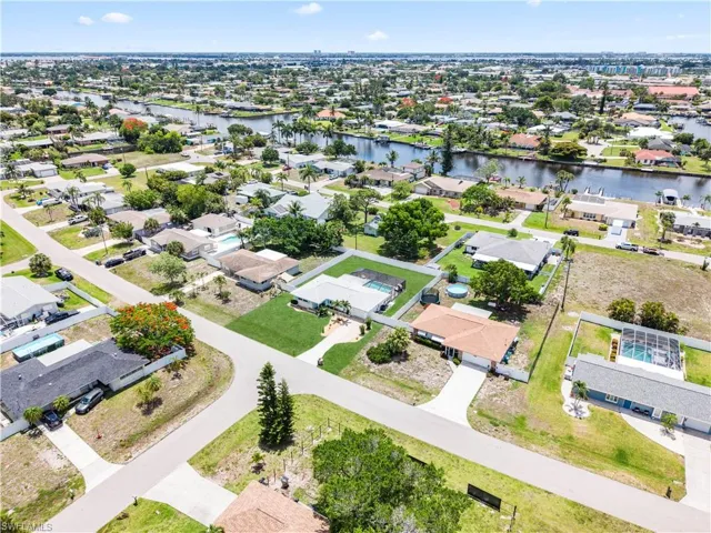 Aerial perspective highlighting a residential area with multiple properties