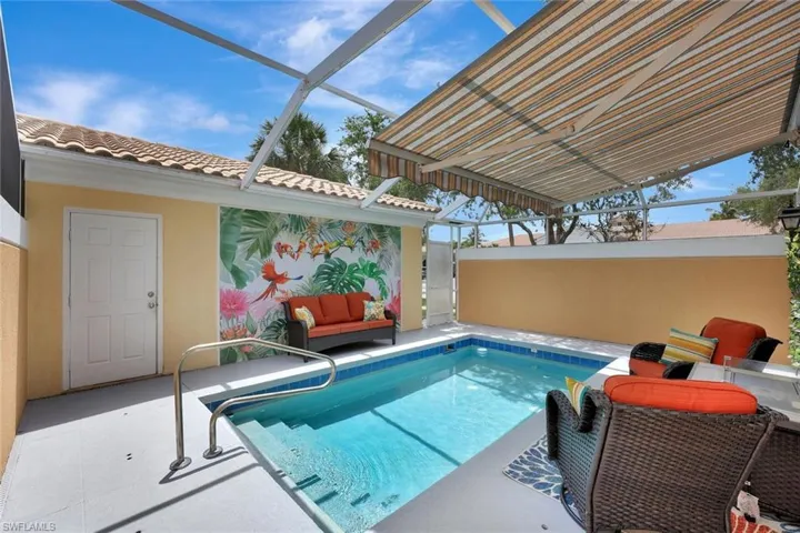Rarely available townhome with a pool STEPS away from clubhouse.