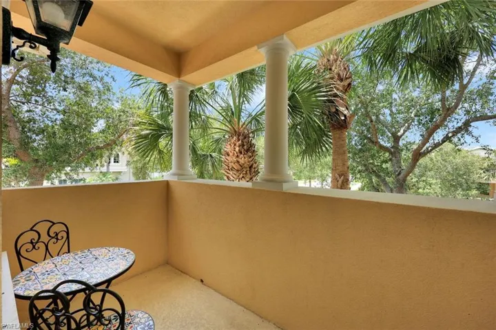 Take in serene views of lush greenery from the balcony...