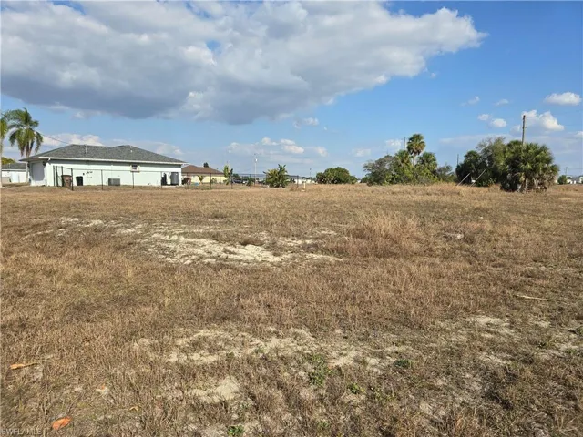 View of yard with a view of countryside