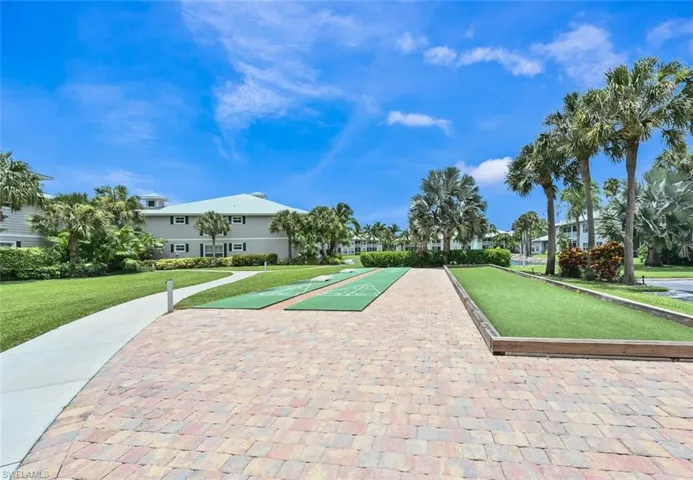 View of home's community featuring a lawn