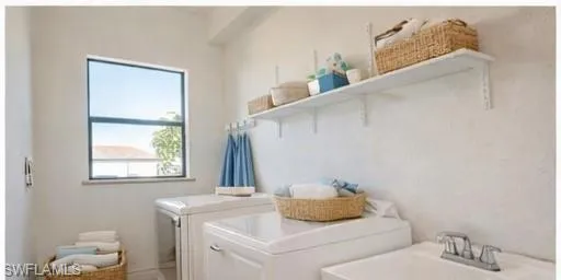 Laundry area featuring washer and dryer