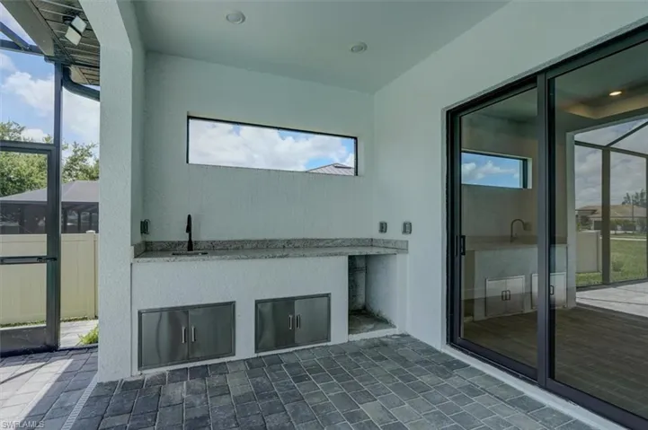 Bathroom featuring sink and tile patterned floors