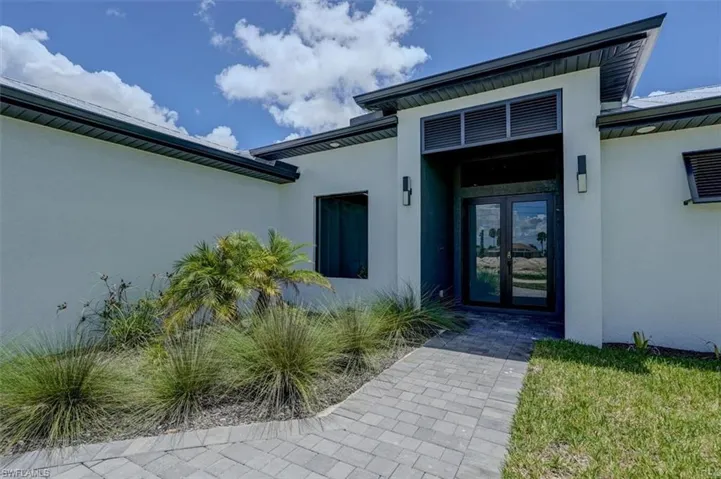 Doorway to property with glass french doors