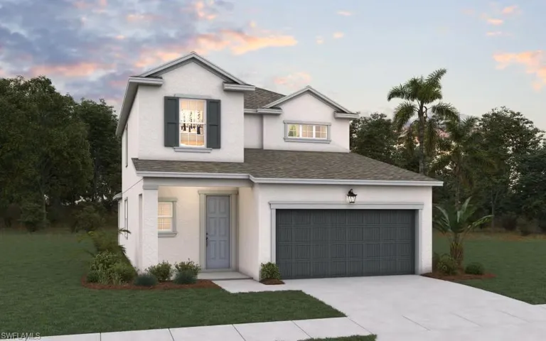 Traditional home featuring a shingled roof, concrete driveway, a front lawn, and stucco siding
