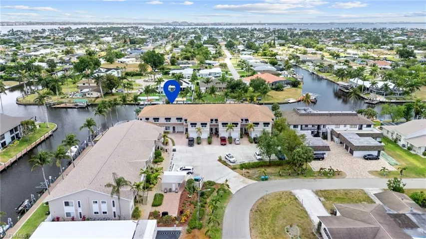 Bird's eye view featuring a water view and a residential view