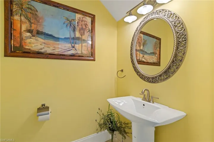 Bathroom with lofted ceiling