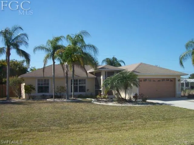 Very well maintain 3/2/2 with pool and fenced yard