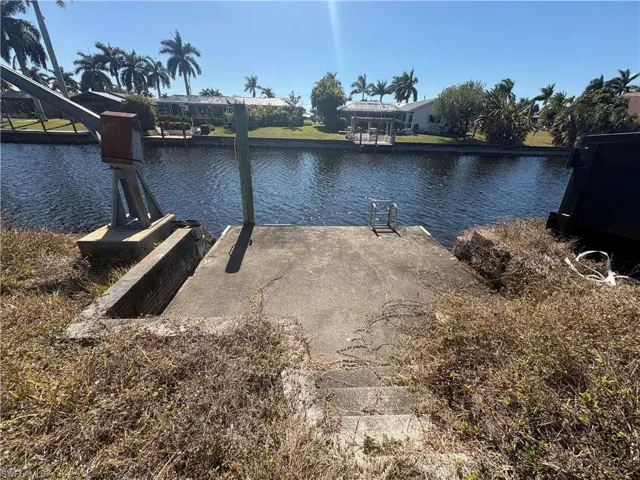 Dock featuring a water view