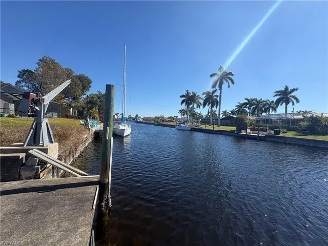 Dock featuring a water view and a residential view