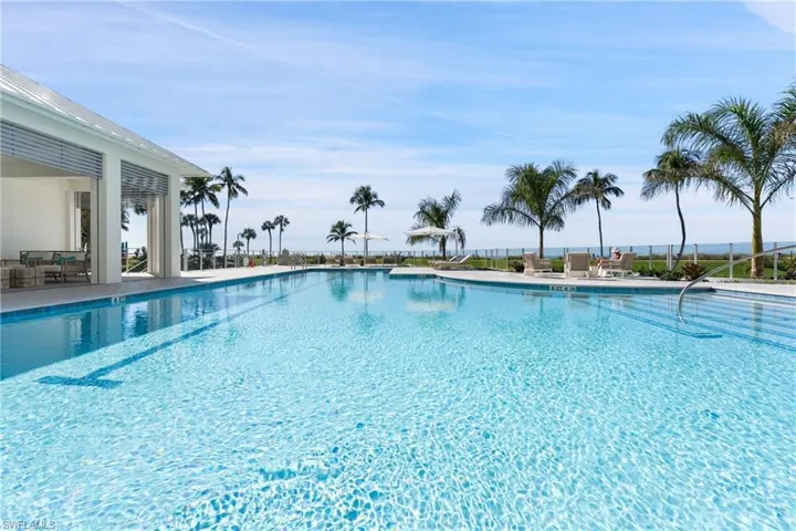 Community pool with a patio area