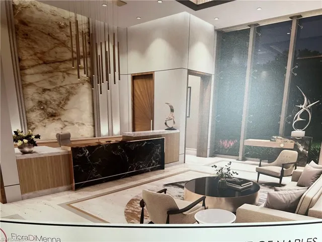 Living room featuring a high ceiling