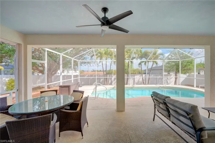Screened in lanai viewing fenced yeard