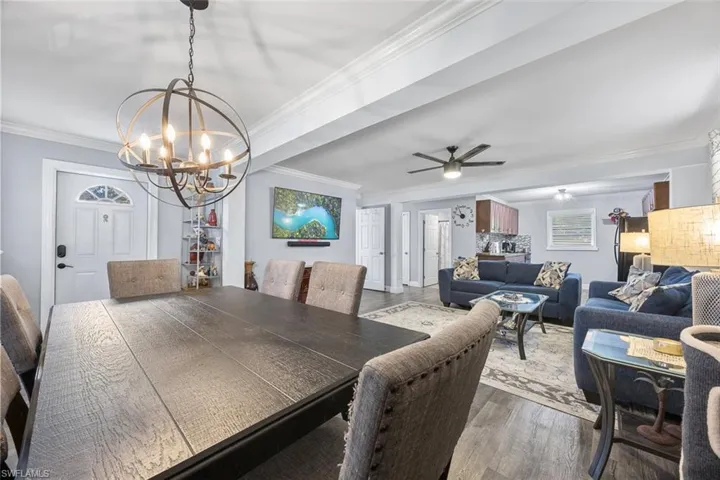 Dining area featuring featuring chandelier