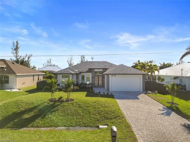 Virtually Staged-Rear view of property with a lawn, an outdoor living space, a patio area, and a fenced in pool