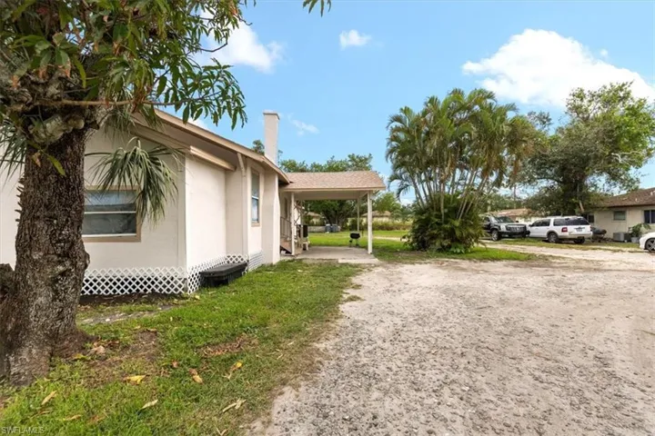View of yard featuring a carport