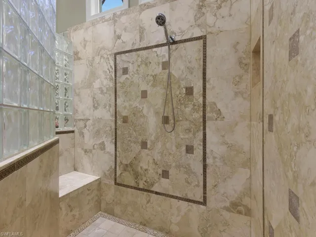 Primary Bathroom featuring a walk in shower
