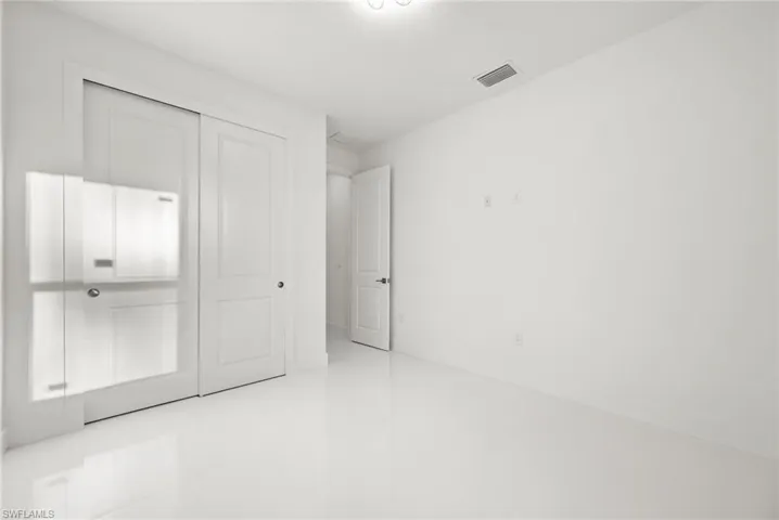 Unfurnished bedroom featuring a closet